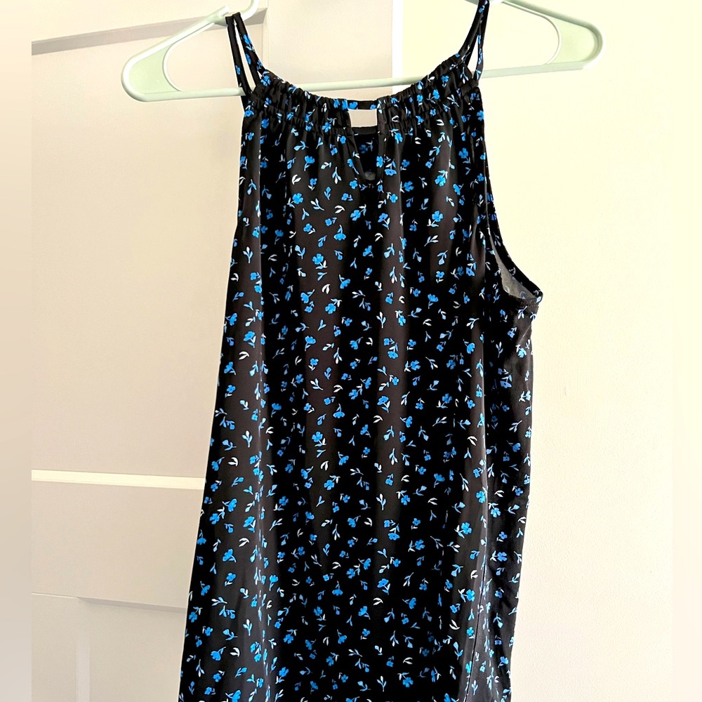 Strappy top, mixed materials, new with tags, blue flower print,size medium